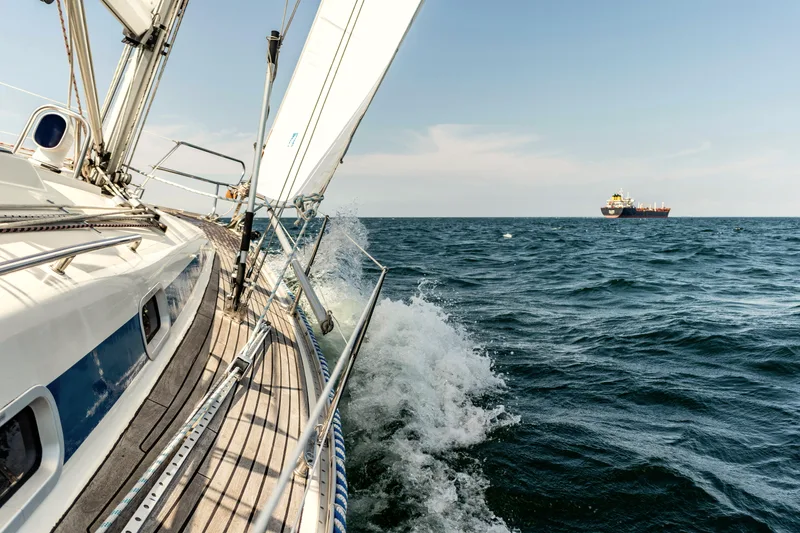 A small charter boat under sail